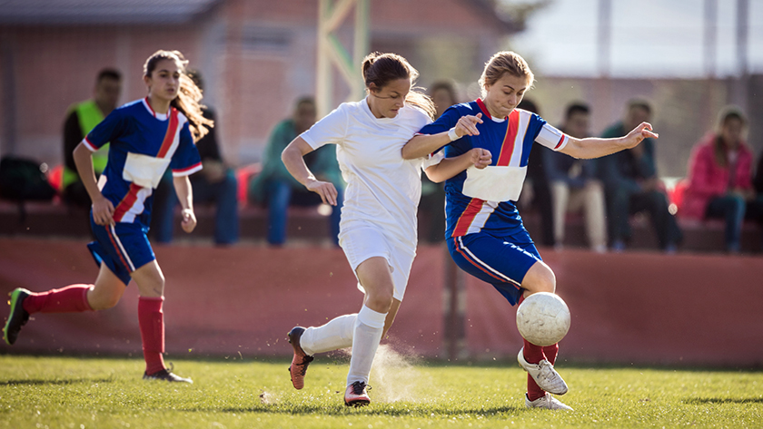women playing soccer