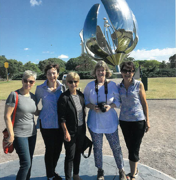 Gill in group shot with travel companions