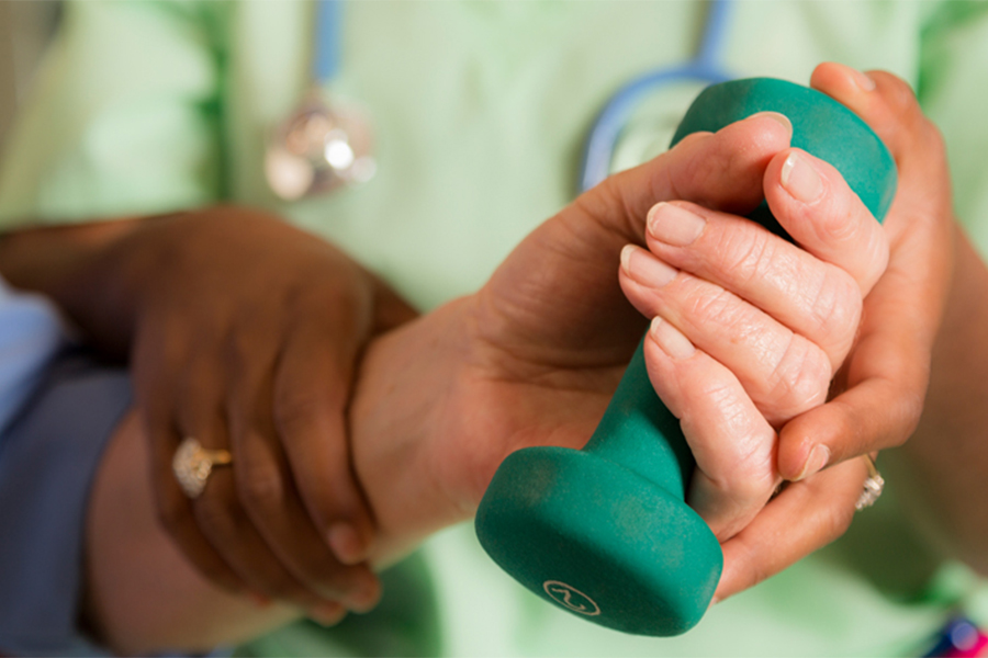 stock photo: hand holding a weight