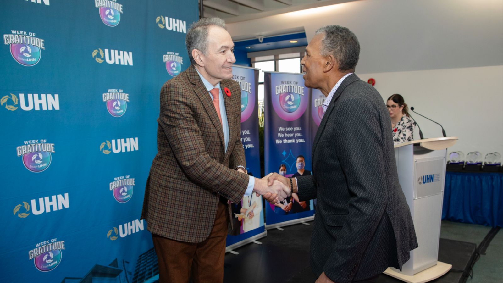 UHN Patient Partner Earl Miller, (R), is greeted by Dr. Kevin Smith