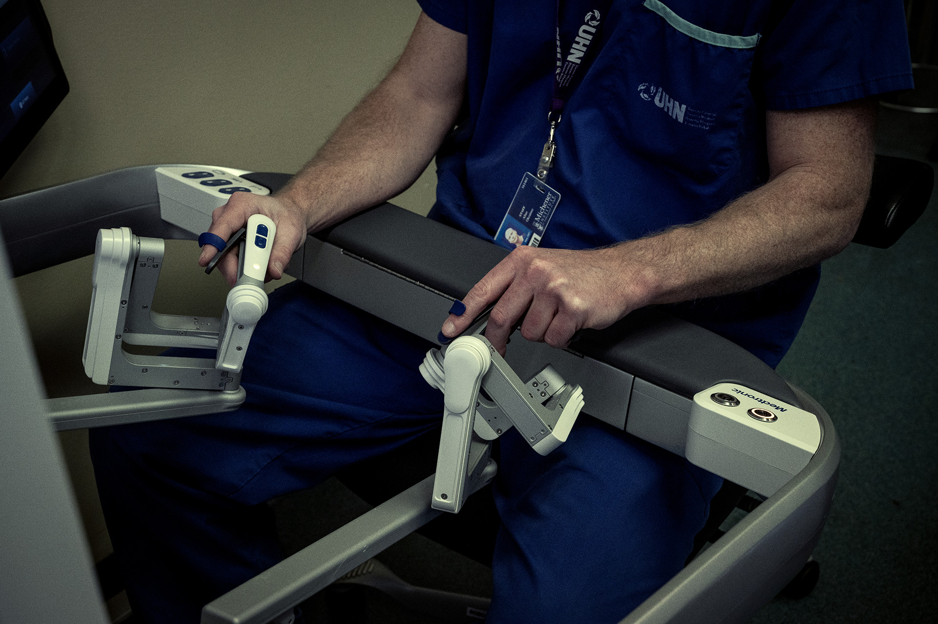 Dr. Allan Okrainec controlling a surgical robots.