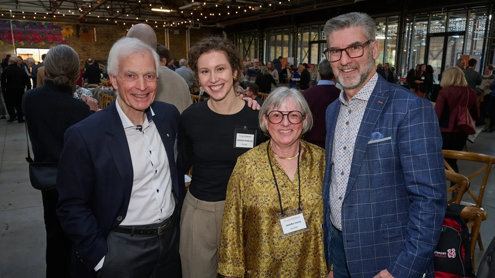 (L to R) Dr. Anthony Lang, event co-chair Adrienne Anderson, event co-chair, Harry Forestell