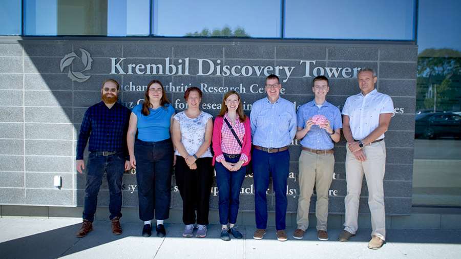 Susan, Brett and Sawyer Thompson visit UHN's Krembil Research Institute to meet the World Community Grid team, led by Dr. Igor Jurisica, (R). (Photo: UHN)