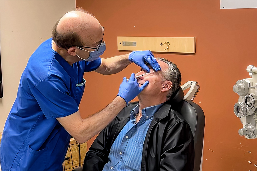 Dr. Stephen Kraft with a patient